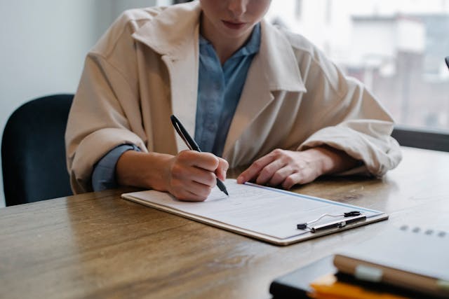 prospective tenant filling out a rental application