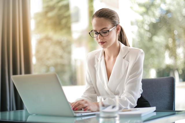 a property manager sitting a their desk working on their computer